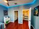 Bright bedroom with LED accent lighting, ceiling fan, and walk-in closet at 18018 Malakai Isle Dr, Tampa, FL 33647
