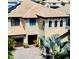 Attractive two-story home featuring a tile roof, arched windows and a two car garage at 18018 Malakai Isle Dr, Tampa, FL 33647