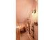 Unique wine cellar with decorative lighting, custom wine racks, and serving area for drinks at 18018 Malakai Isle Dr, Tampa, FL 33647