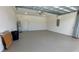 Spacious two car garage featuring an automatic door and plenty of storage room at 3269 Ponce De Leon Blvd, North Port, FL 34291