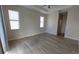 Spacious main bedroom with ceiling fan, tile floors, and bright natural light at 3269 Ponce De Leon Blvd, North Port, FL 34291