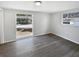 This bedroom is a blank canvas and features two windows to let natural light in at 7604 Tyson Dr, Port Richey, FL 34668