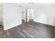 Spacious bedroom with walk-in closet and new laminate flooring at 7604 Tyson Dr, Port Richey, FL 34668