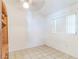 Empty bedroom with tile floor, bright natural light and a ceiling fan at 18430 Alphonse Cir, Port Charlotte, FL 33948