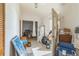 Bright entryway with tile flooring, view into living space; natural light streaming in at 18430 Alphonse Cir, Port Charlotte, FL 33948