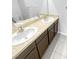 Bathroom featuring a double sink vanity with ample counter space and cabinet storage at 10956 Carlton Fields Dr, Riverview, FL 33579