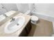 An interior bathroom with a single vanity and sink and a bathtub with shower head at 10956 Carlton Fields Dr, Riverview, FL 33579