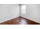Bedroom featuring natural light with hardwood floors and neutral colors at 10956 Carlton Fields Dr, Riverview, FL 33579