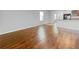 Spacious living room featuring hardwood floors and open layout at 10956 Carlton Fields Dr, Riverview, FL 33579