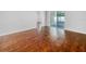 Spacious room leading to a covered patio area with new flooring and neutral colors at 10956 Carlton Fields Dr, Riverview, FL 33579