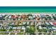 An aerial view of the house, highlighting its location relative to the beach at 16107 Gulf Blvd, Redington Beach, FL 33708