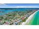 Panoramic aerial view showcasing the property's proximity to the beach and the inter-coastal waterway at 16107 Gulf Blvd, Redington Beach, FL 33708