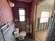 Bathroom shows toilet and sink hook-up awaiting remodel and finishing at 16107 Gulf Blvd, Redington Beach, FL 33708