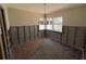 Dining room undergoing renovation with a large window at 16107 Gulf Blvd, Redington Beach, FL 33708