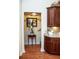 Hallway with kitchen cabinets and decor including a Gathering photo at 2906 Country Breeze Dr, Plant City, FL 33567