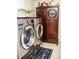 Modern washer and dryer set in a well-lit laundry room at 2906 Country Breeze Dr, Plant City, FL 33567