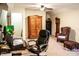 Office space with desk, chair, and a grandfather clock at 2906 Country Breeze Dr, Plant City, FL 33567