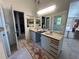 Bathroom with double sinks and a spacious vanity, providing ample storage at 18620 Wayne Rd, Odessa, FL 33556