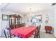 Formal dining room with elegant table setting and antique china cabinet at 251 Tropic W Blvd, Largo, FL 33770
