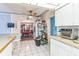 Open kitchen layout with bar counter looking into dining room at 251 Tropic W Blvd, Largo, FL 33770