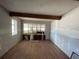 A living room featuring hardwood floors and a large window offering plenty of natural light at 432 2Nd Ne Ave, Largo, FL 33770