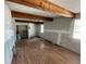 Spacious living room with hardwood floors and exposed wooden beams, offering unique character at 432 2Nd Ne Ave, Largo, FL 33770