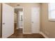 Bedroom with hardwood floors and access to bathroom and closets at 1020 58Th N Ave, St Petersburg, FL 33703
