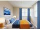 Bedroom with natural lighting, hardwood floors, and tasteful decor at 1020 58Th N Ave, St Petersburg, FL 33703