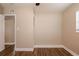 Clean bedroom featuring hardwood floors, neutral paint, and natural light from a window at 1020 58Th N Ave, St Petersburg, FL 33703