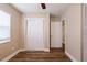 Bedroom features hardwood floors, neutral paint, and two storage closets for ample storage at 1020 58Th N Ave, St Petersburg, FL 33703