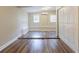 Bonus room featuring hardwood floors, natural light, and closet at 1020 58Th N Ave, St Petersburg, FL 33703