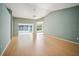 Spacious living room with high ceilings and hardwood floors at 2015 Gardenia Landings Ln, Sun City Center, FL 33573