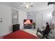 Bedroom with window, TV, and work area perfect for relaxing or focusing on getting tasks done at 12829 Kings Lake Dr, Gibsonton, FL 33534