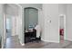 Cozy home office nook with modern desk, chair, and light wood flooring throughout the space at 12829 Kings Lake Dr, Gibsonton, FL 33534