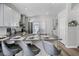 Stylish kitchen with granite countertops, barstool seating, and stainless steel appliances at 12829 Kings Lake Dr, Gibsonton, FL 33534