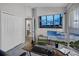 Contemporary office featuring dual monitors, TV, and ample storage provides a functional and stylish workspace at 12829 Kings Lake Dr, Gibsonton, FL 33534