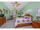 Spacious bedroom featuring lots of room, natural light, and comfortable furnishings at 37511 Washington Loop Road, Punta Gorda, FL 33982