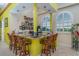 Entertain in style with this beautiful kitchen's bar area, complete with ample seating and unique decor at 37511 Washington Loop Road, Punta Gorda, FL 33982