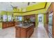 Expansive kitchen featuring double islands, ample storage and lots of counter space at 37511 Washington Loop Road, Punta Gorda, FL 33982