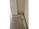 View of the corner of a room with baseboards and damaged walls at 115 1St E St # 103, Tierra Verde, FL 33715