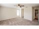 Spacious bedroom with neutral carpet and a ceiling fan at 11212 3Rd E Ave, Bradenton, FL 34212