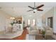 Open-concept living room with adjacent dining area creates a flexible and inviting space at 11212 3Rd E Ave, Bradenton, FL 34212
