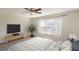 Relaxing main bedroom with large window and ceiling fan provides a tranquil retreat at 11212 3Rd E Ave, Bradenton, FL 34212