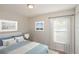 Bright main bedroom with large windows and a ceiling fan creates a peaceful retreat at 11212 3Rd E Ave, Bradenton, FL 34212