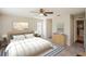 Comfortable bedroom with large window and ceiling fan provides a relaxing space at 11212 3Rd E Ave, Bradenton, FL 34212