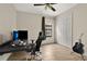 Spare bedroom with a closet, a window with curtains, and space for a computer or hobby setup at 12784 Burns Dr, Odessa, FL 33556