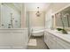 Luxurious bathroom featuring a freestanding tub, glass shower, and marble countertops at 1751 Bobcat Trl, North Port, FL 34288