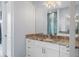 Bathroom features granite countertops, undermount sinks, white shaker cabinets, and nice lighting at 3244 55Th Ave N, St Petersburg, FL 33714