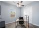 Office space with carpet, desk, ceiling fan, and natural light at 3244 55Th Ave N, St Petersburg, FL 33714