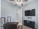 Office space with desk, TV and storage at 3244 55Th Ave N, St Petersburg, FL 33714